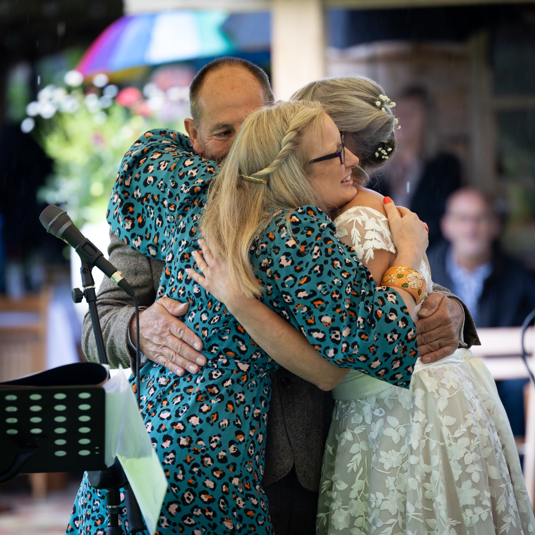 Deb Reed Celebrant Essex Colchester hugging Gary and Annette at their wedding.