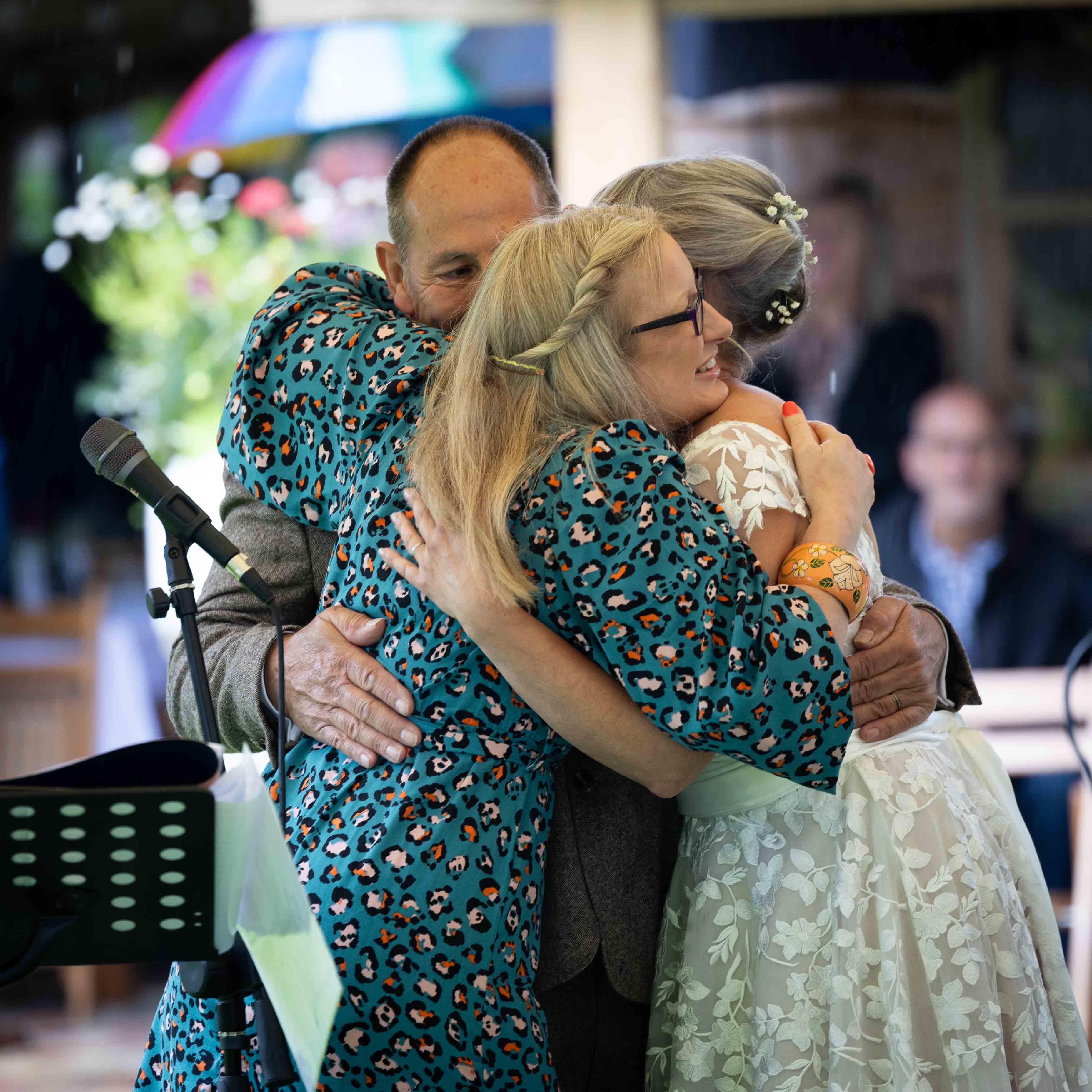 Deb Reed Celebrant Colchester Essex, hugging at Gary and Annette's wedding.